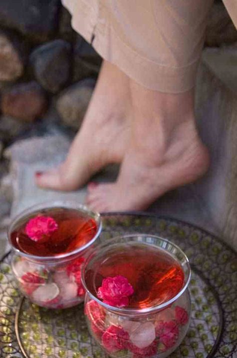 Little Mischief rose flowers floating in drink